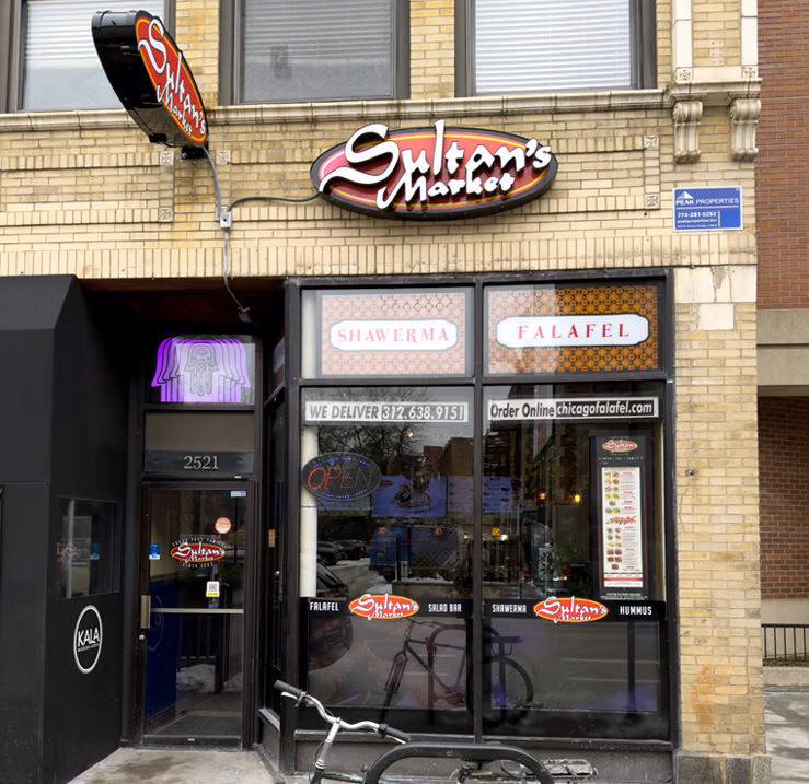 Sultan’s Market Lincoln Park storefront in Chicago featuring dimensional illuminated restaurant signage.