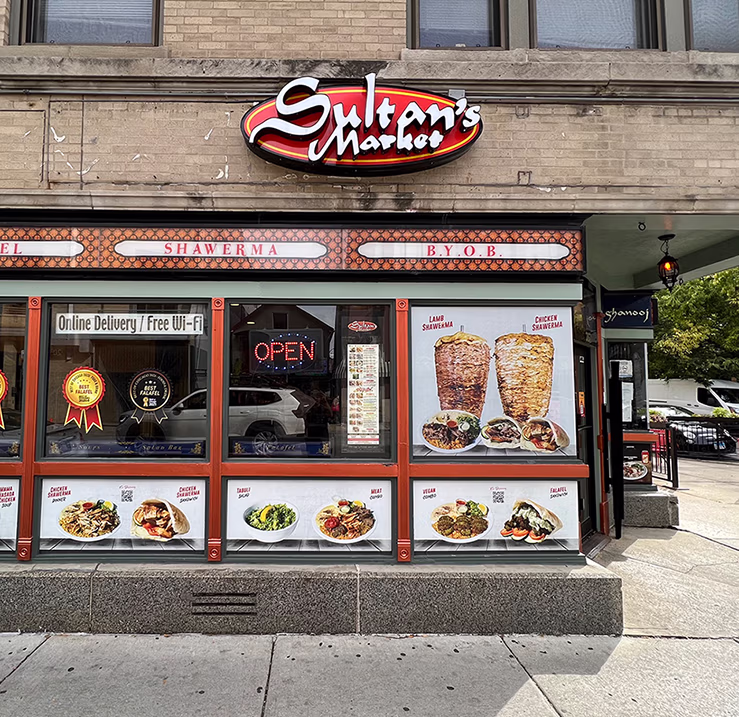 Sultan’s Market Wicker Park storefront in Chicago featuring dimensional illuminated restaurant signage.